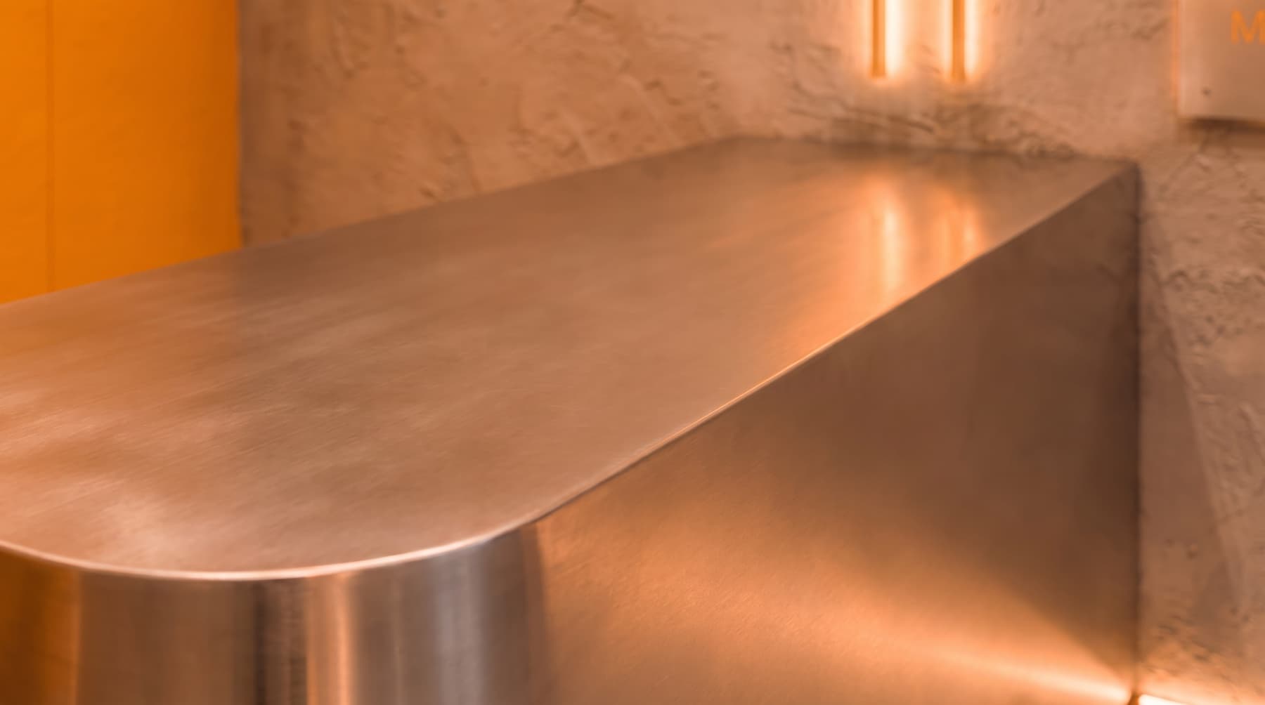 Detail of the brushed steel serving counter