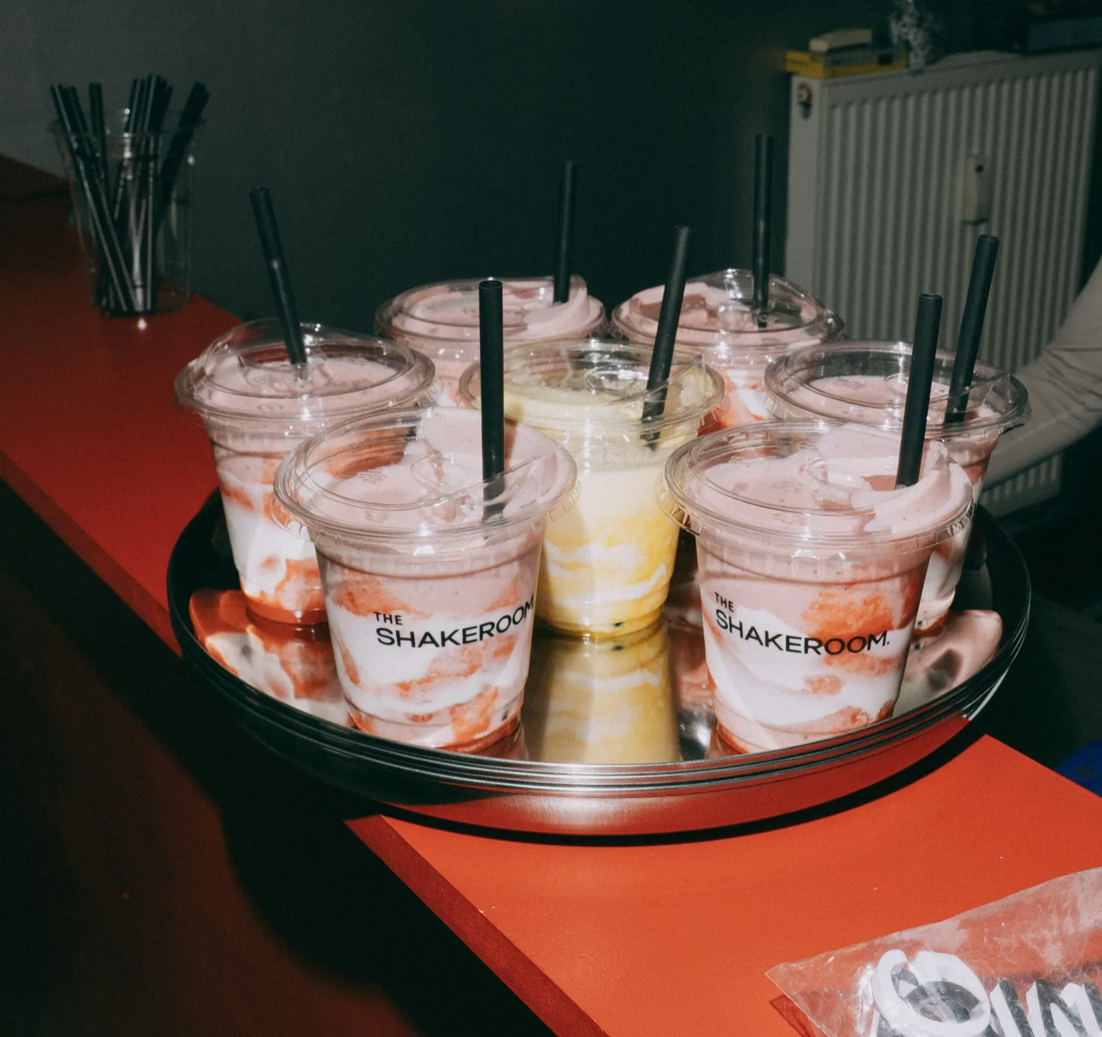 Tray of Shakeroom shakes on a red counter