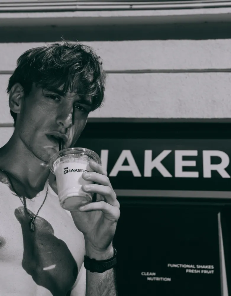 Guest with a Shakeroom cup, black and white